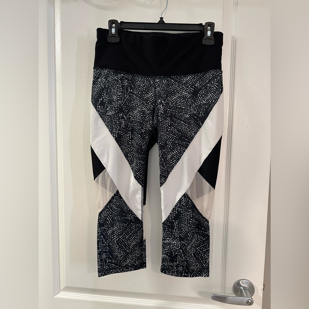 Black and white leggings, size Medium, gently used